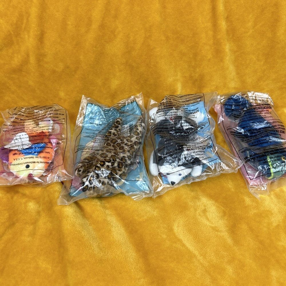 McDonald's Happy Meal Toys lot of 4 in Original Packaging